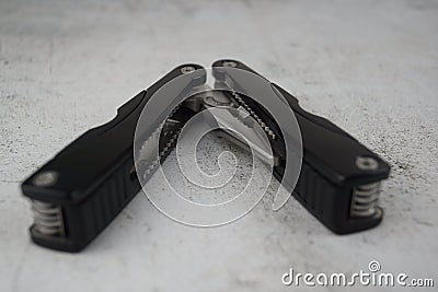 Universal folding knife with pliers Stock Photo