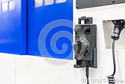 Universal turns dial or spin remote control hand wheel encoder for accuracy adjust parameter of cnc machining center machine Stock Photo
