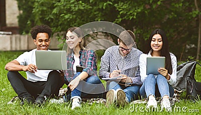 University students with devices preparing for classes Stock Photo