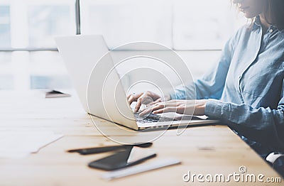 University work process concept. Student girl working new project with generic design laptop. Smartphone wooden table Stock Photo