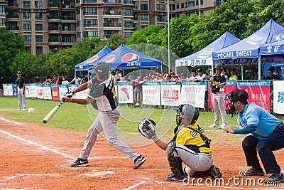 Unknown batter hitting the ball Editorial Stock Photo