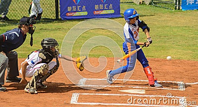 Unknown batter about to hit the ball Editorial Stock Photo