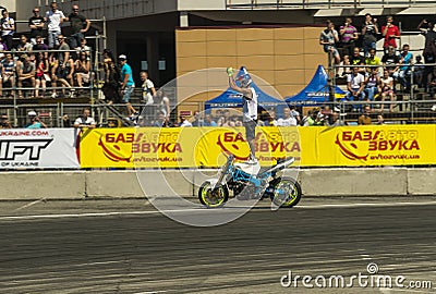 Unknown stunt biker entertain the audience Editorial Stock Photo