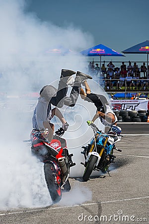 Unknown stunt bikers entertain the audience Editorial Stock Photo