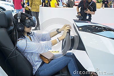 Unknown woman trying Honda Sensing at GIIAS Editorial Stock Photo