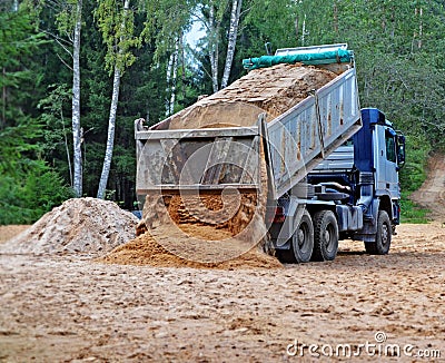 Unloading of a dump truck Stock Photo