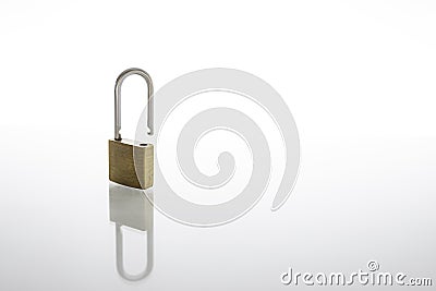 Unlocked and opened padlock as security or privacy concept, isolated on white background with reflex Stock Photo