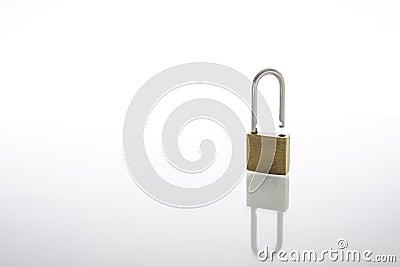 Unlocked and opened padlock as security or privacy concept, isolated on white background with reflex Stock Photo