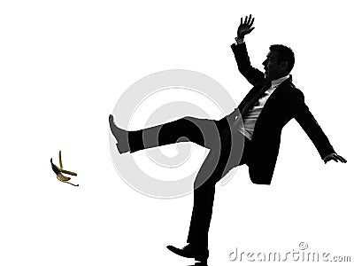 Unlucky carefree business man silhouette Stock Photo