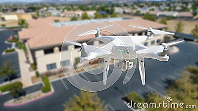 Unmanned Aircraft System Quadcopter Drone In The Air Near Corporate Industrial Building Stock Photo