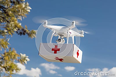 Unmanned Aircraft System UAS Quadcopter Drone Carrying First Aide Kit Editorial Stock Photo