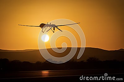 An unmanned drone low pass in sunset Stock Photo
