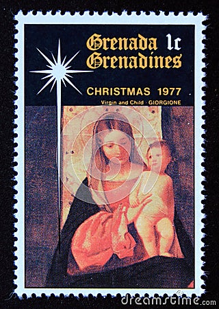 Unused postage stamp Grenada Grenadine 1977, Adoration of the Child Jesus, Giorgione Editorial Stock Photo