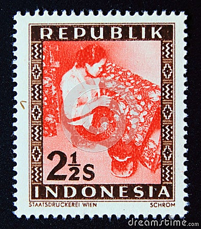 Unused postage stamp Republic Indonesia 1949, Female Batik worker Editorial Stock Photo