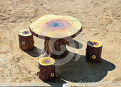 Unnatural table and chairs in the form of stumps Stock Photo