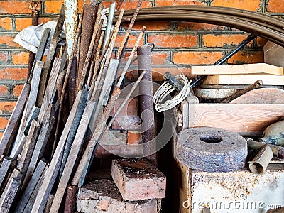 Unnecessary tools in a rustic shed Stock Photo