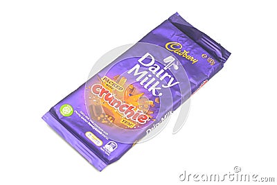An unopened Cadbury Dairy Milk Crunchie Editorial Stock Photo