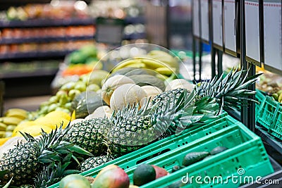 Unpacked, fresh exotic fruits in a self-service supermarket Stock Photo