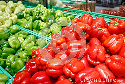 Unpacked, fresh peppers in a self-service supermarket Stock Photo