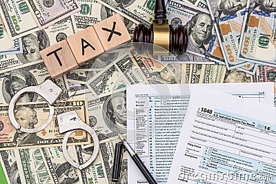 Unpaid taxes and punishment concept on dollar background Editorial Stock Photo