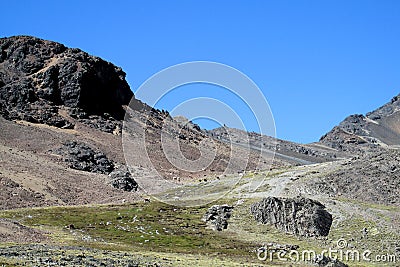 Unparved road in the Andes, Cordillera Real, Bolivia Stock Photo