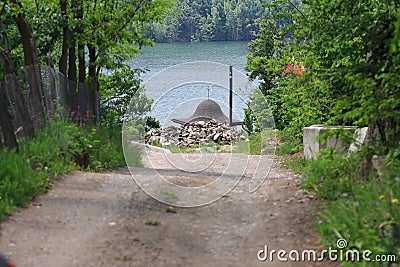 Unpaved road that leads to the most beautiful lake in Romania, the Siriu lake Stock Photo
