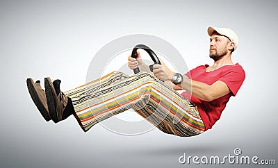 Unreal funny car driver in the humorous wristwatch Stock Photo