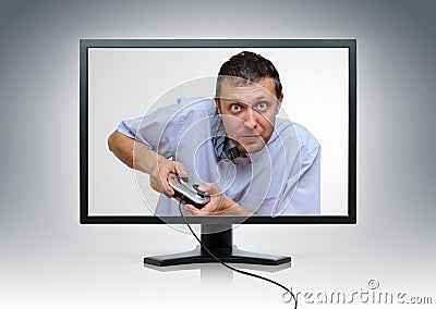 Unreal Office worker gamer from the display Stock Photo