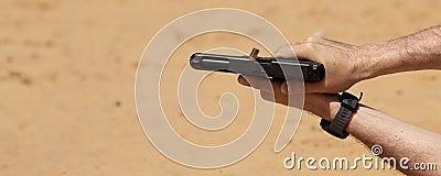 Unrecognisable man practising shooting pistol at the shooting range. Stock Photo