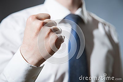 Unrecognizable businessman showing a strong fist Stock Photo