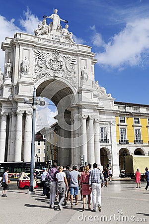 Unrecognizable Group of Tourists - Triumph Arch, Lisbon Editorial Stock Photo