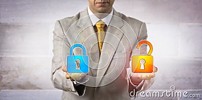 IT Manager Showing A Locked And An Open Padlock Stock Photo