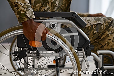 Unrecognizable military man with disability in wheelchair Stock Photo