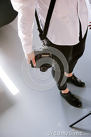 Unrecognizable photographer with camera Stock Photo