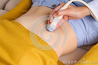 Faceless doctor doing ultrasound scanning of right lobe, gallbladder, liver and bile ducts Stock Photo