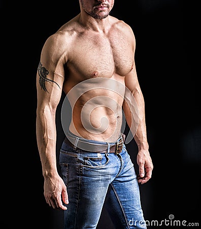 Unrecognizable young man with naked muscular torso Stock Photo