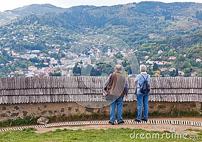 Tourists admire the view from Calvary in Banska Stiavnica, Slovakia. Editorial Stock Photo