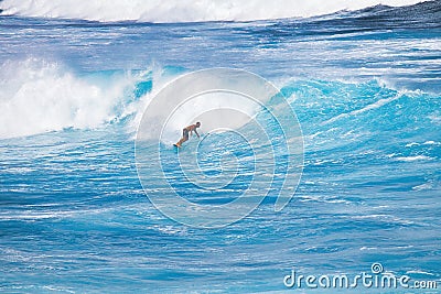 Unregognizable surfer against an endless bue ocean. Editorial Stock Photo