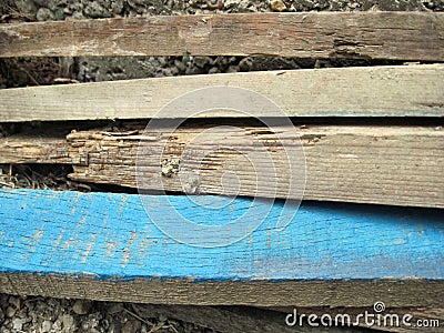 4 old sticks lying on top of each other Stock Photo