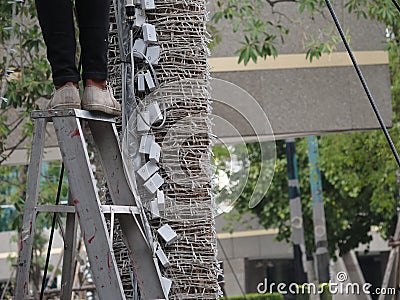 Unsafe step on ladder Stock Photo