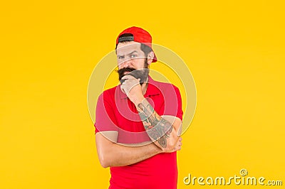 Unshaven and bearded. Bearded man yellow background. Hipster with bearded face. Shaving salon. Beard barber. Barbershop Stock Photo