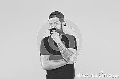 Unshaven and bearded. Bearded man yellow background. Hipster with bearded face. Shaving salon. Beard barber. Barbershop Stock Photo