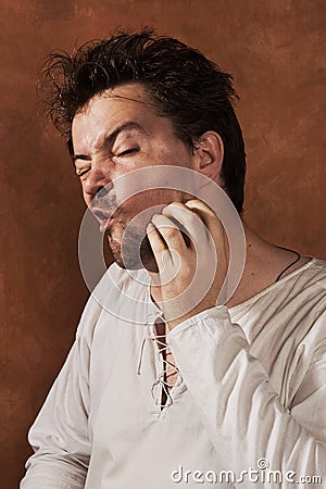 Unshaven drunk man Stock Photo