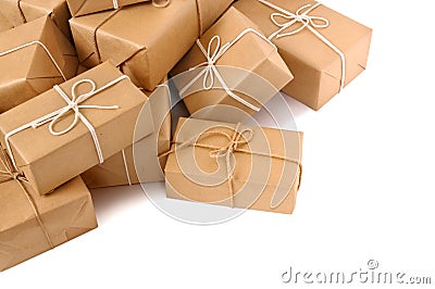 Untidy pile of brown paper packages isolated on white Stock Photo