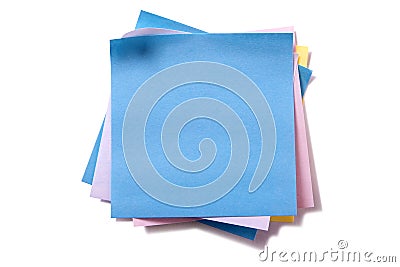 Untidy pile various colors sticky post notes on white background Stock Photo