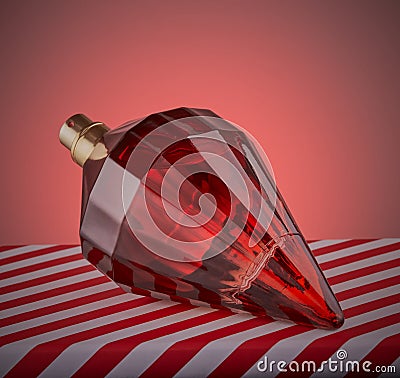 Classy red perfume bottle. Stock Photo