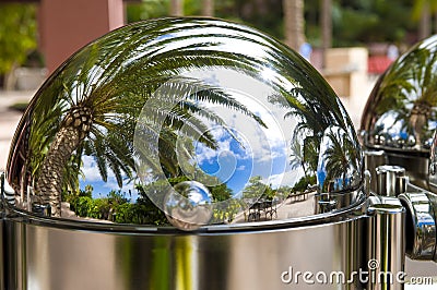 Unseen reality - beautiful resort in a silver cloche - dome Stock Photo
