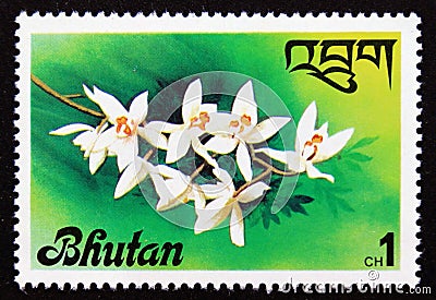Unused post stamp Bhutan 1976, Coelogyne nitida flowers Editorial Stock Photo
