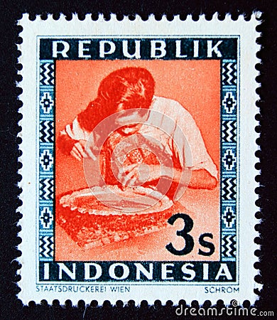 Unused postage stamp Republic Indonesia 1949, male metal worker Editorial Stock Photo