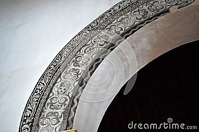 Unusual arch decorated by skull in San Antonio church in Frigiliana - Spanish white village Andalusia Stock Photo